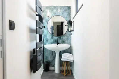 Salle de bains dans l'établissement Appartement Beau Séjour - Accès Piscine
