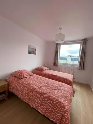 Un ou plusieurs lits dans un hébergement de l'établissement La Villa Marine BY HOLIDIEPPE
