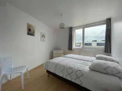 Un ou plusieurs lits dans un hébergement de l'établissement La Villa Marine BY HOLIDIEPPE