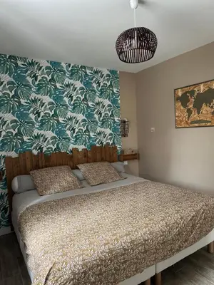 Un ou plusieurs lits dans un hébergement de l'établissement Victory Lodge spa
