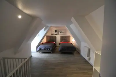 Un ou plusieurs lits dans un hébergement de l'établissement L Euphorie - Maison de ville de caractère 7 minutes de la mer - Le Treport - Mers les Bains