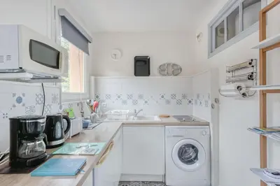 Cuisine ou kitchenette dans l'établissement Aqualina