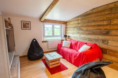 Coin salon dans l'établissement Gîte Plume et Potiron