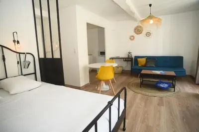 Un ou plusieurs lits dans un hébergement de l'établissement LOU La Chaloupe