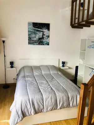 Un ou plusieurs lits dans un hébergement de l'établissement Résidence chêne percé Appartement au RDC 51 m2