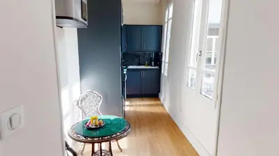 Cuisine ou kitchenette dans l'établissement La Suite Royale