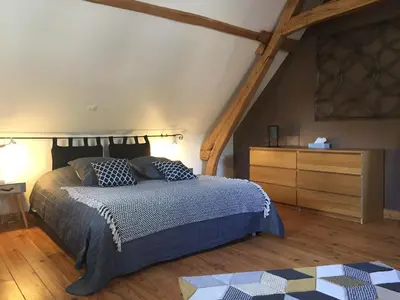 Un ou plusieurs lits dans un hébergement de l'établissement location de chambre en petit duplex proche de la baie de Somme