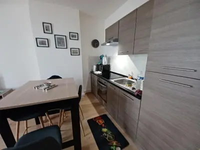 Cuisine ou kitchenette dans l'établissement DIEPPE au coeur du cville-Calme avec balcon