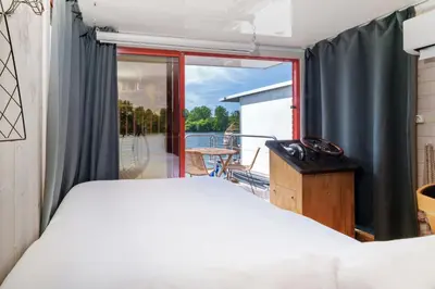 Un ou plusieurs lits dans un hébergement de l'établissement L'Escale Royale Saint-Martin-la-Garenne Port Ilon - Seine - Giverny