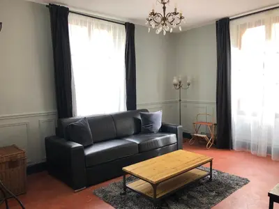 Coin salon dans l'établissement Château du Prieuré Évecquemont