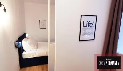 Un ou plusieurs lits dans un hébergement de l'établissement Cosy Normandy - 01