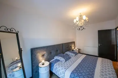 Un ou plusieurs lits dans un hébergement de l'établissement La Suite de Chantilly - Appartement de 80m2 avec Jacuzzi privé !