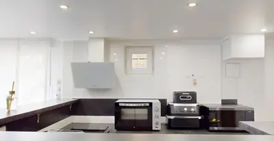 Cuisine ou kitchenette dans l'établissement Kimia House appartement spacieux
