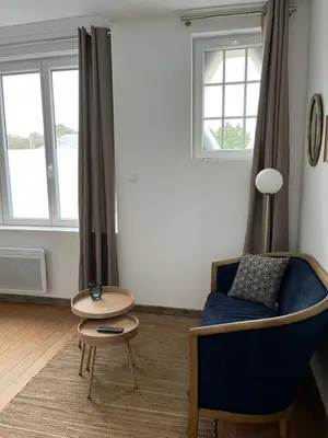 Coin salon dans l'établissement Appartement 2 personnes : LES CANAUX