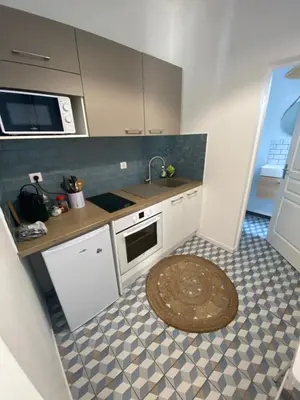 Cuisine ou kitchenette dans l'établissement Appartement Rez de chaussé