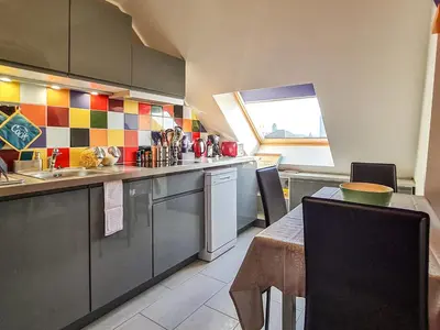 Cuisine ou kitchenette dans l'établissement Cosy'Appart - LE GERVAIS