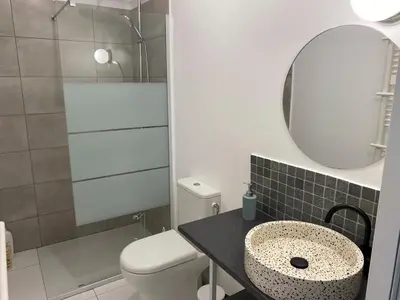 Salle de bains dans l'établissement appartements proche gare