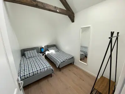 Un ou plusieurs lits dans un hébergement de l'établissement appartements proche gare