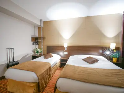 Un ou plusieurs lits dans un hébergement de l'établissement Hôtel Inn Design & Restaurant Amiens