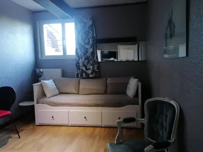 Coin salon dans l'établissement Charmant Appartement 10mn Rouen