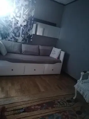 Coin salon dans l'établissement Charmant Appartement 10mn Rouen