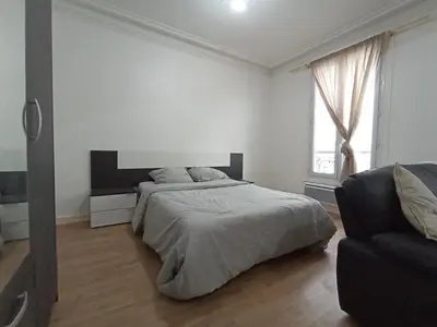 Un ou plusieurs lits dans un hébergement de l'établissement Beautiful appartement, 20 min to Champs-Elysées