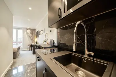 Cuisine ou kitchenette dans l'établissement Les Perles Amiénoises-Suite Luxe Centre-Parking