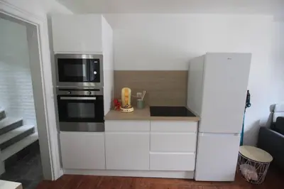 Cuisine ou kitchenette dans l'établissement Duplex - En plein Centre Ville - 6 pers