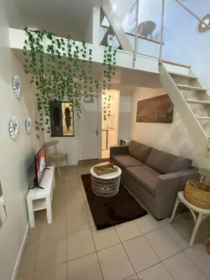 Coin salon dans l'établissement Grand studio Ermont