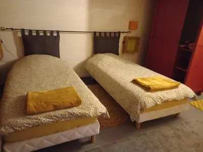 Un ou plusieurs lits dans un hébergement de l'établissement Bungalow la Bohémienne