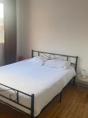 Un ou plusieurs lits dans un hébergement de l'établissement Maison Bord de Mer