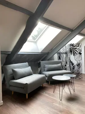 Coin salon dans l'établissement Villa Manoca