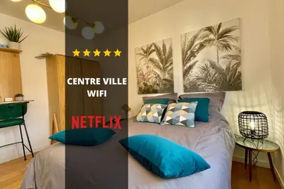 Un ou plusieurs lits dans un hébergement de l'établissement DOWNTOWN COCOON - CENTRE VILLE - WiFi - NETFLIX