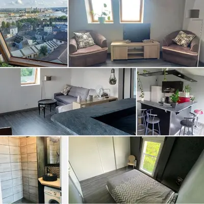 Coin salon dans l'établissement Rouen : Vue panoramique sur la seine avec parking