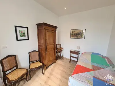 Un ou plusieurs lits dans un hébergement de l'établissement Le Phare Dieppois by JPS Holiday - Chaleureux appartement au cœur de Dieppe