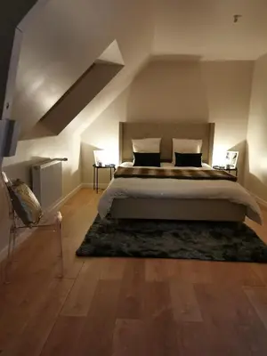 Un ou plusieurs lits dans un hébergement de l'établissement Maison Design entre Paris, Deauville et Rouen