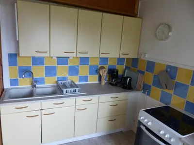 Cuisine ou kitchenette dans l'établissement Duplex 4 personnes La Calypso