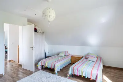 Un ou plusieurs lits dans un hébergement de l'établissement Villa Bel Air