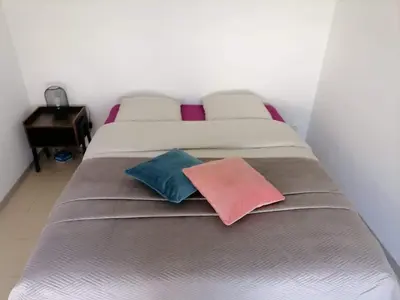 Un ou plusieurs lits dans un hébergement de l'établissement Le pied à terre