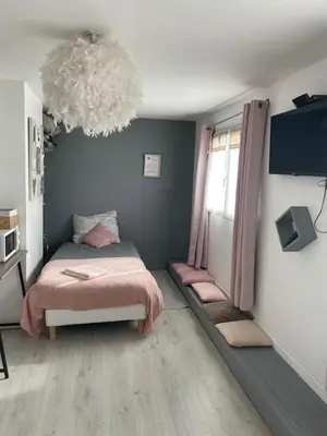 Un ou plusieurs lits dans un hébergement de l'établissement Chambre celia lits séparés