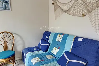 Coin salon dans l'établissement Appartement avec vue sur le port et proche de la mer