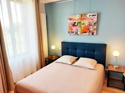 Un ou plusieurs lits dans un hébergement de l'établissement LES JACQUEMARTS NORMANDS Maison d'hôtes - Guesthouse