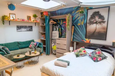 Un ou plusieurs lits dans un hébergement de l'établissement Jungle Studio - 2P à 4P -Henriville
