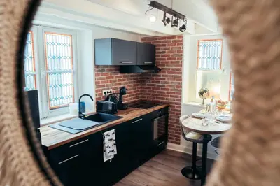 Cuisine ou kitchenette dans l'établissement L'Effet Mer - Duplex - Proche Plage - 2 PERS