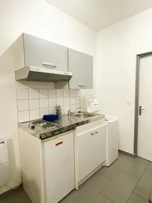 Cuisine ou kitchenette dans l'établissement Bienvenue dans le centre ville d’Amiens