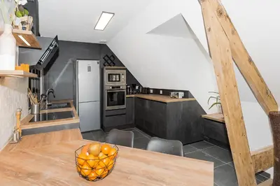 Cuisine ou kitchenette dans l'établissement l'authentique en hyper centre ville