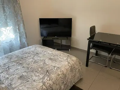 Télévision ou salle de divertissement dans l'établissement Studio 005