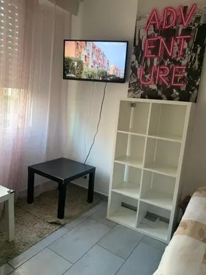Télévision ou salle de divertissement dans l'établissement Studio à mantes
