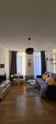 Un ou plusieurs lits dans un hébergement de l'établissement Cosy Studio au coeur de Rouen