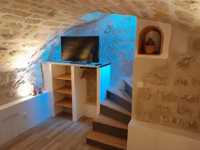 Télévision ou salle de divertissement dans l'établissement Gite de la Reine Blanche